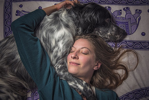 Compassionate veterinary team member providing end-of-life comfort care for a pet

